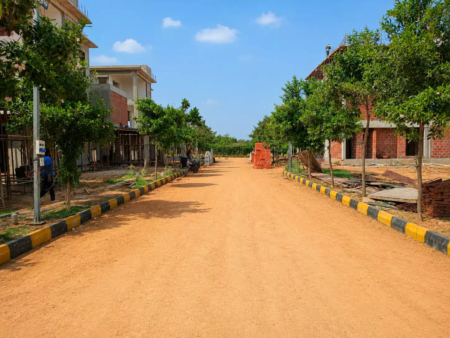 Contemporary 4BHK villa exterior with stone cladding at Fleetwood Villas Sanghiguda by KLR Projects